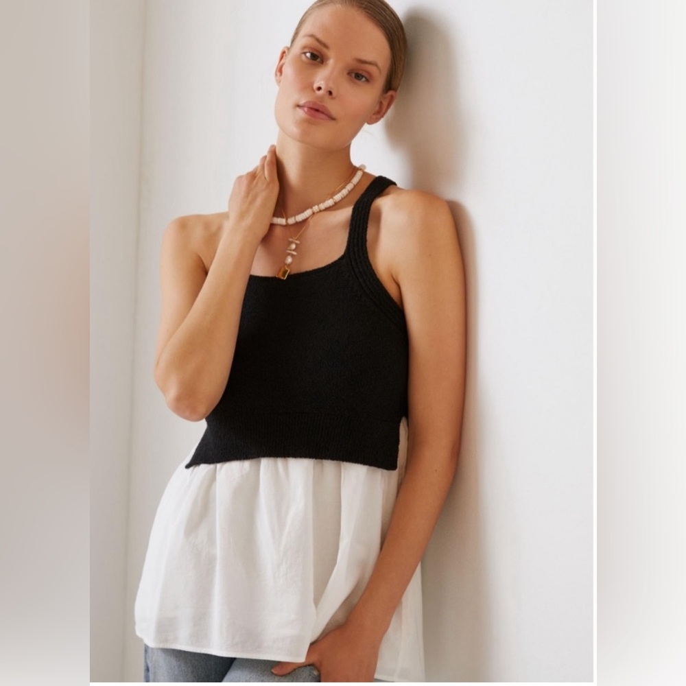 By Anthropologie navy sweater tank with white undershirt. Size XS